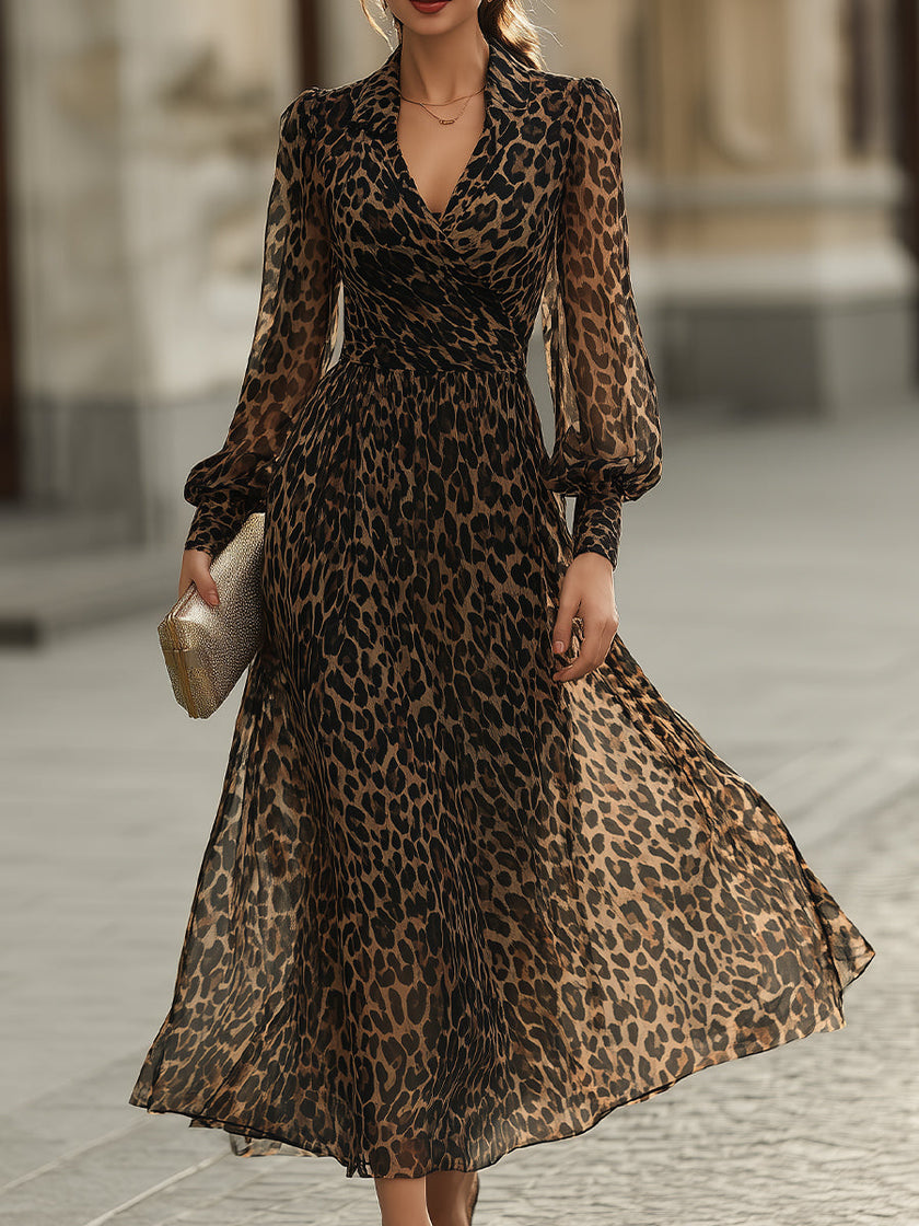 FJØRNA leopard print wrap midi dress with long sleeves, showcasing a stylish and fitted design on a model.