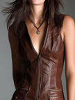 Brown eco leather zip-front mini dress for women by FJØRNA, featuring a fitted silhouette and stylish design.