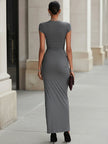 Grey FJØRNA ruched maxi dress for women, flowing fabric with gathered details, perfect for elegant casual wear.