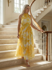 FJØRNA women's summer midi dress with halter neck, sleeveless, flowy design, perfect for warm weather.