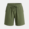 FJØRNA men's textured drawstring relaxed-fit casual summer shorts displayed on a model, with pockets and adjustable waistband.