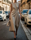 FJØRNA women's midi dress with round neckline and pleated sleeveless design, elegant and stylish for casual or formal wear.