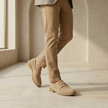 Men's suede slip-on loafers by FJØRNA, showcasing the stylish brown suede shoes with a smooth, rounded toe and slip-on design.