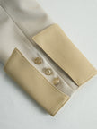 FJØRNA khaki belted waist two-piece trouser set for women, featuring tailored pants with a matching belt and stylish fit.
