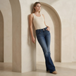 Women's mid-waist slim-fit flared stretch jeans by FJØRNA, showing the classic flared design and fitted waist.