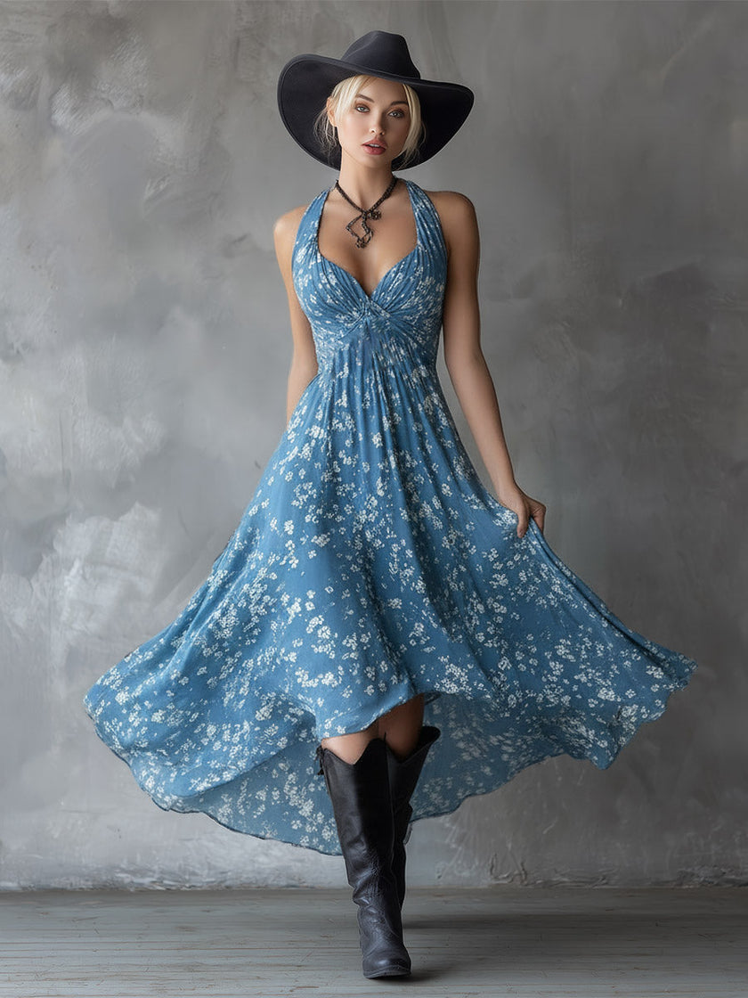 Navy blue chiffon floral maxi dress for women by FJØRNA, featuring a flowy design and vibrant floral pattern.