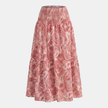 Pink Paisley boho maxi skirt by FJØRNA featuring shirred high waist and flowing white fabric, perfect for bohemian style.