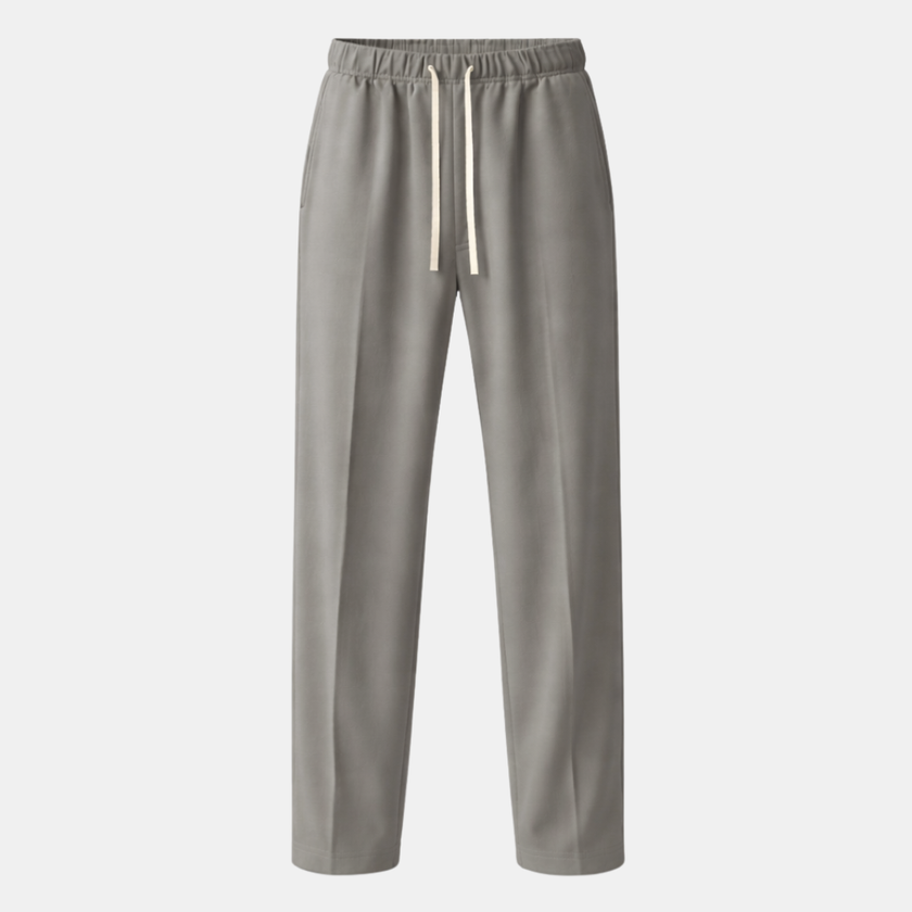 Men's wide-leg drawstring joggers by FJØRNA, relaxed casual sweatpants with elastic waistband and loose fit, shown in black.