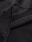 Black chiffon high-neck sleeveless blouse for women by FJØRNA, featuring a stylish high neckline and elegant sleeveless design.