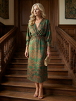 FJØRNA summer midi dress for women with long sleeves and wrap design, featuring a flowy fabric and stylish silhouette.