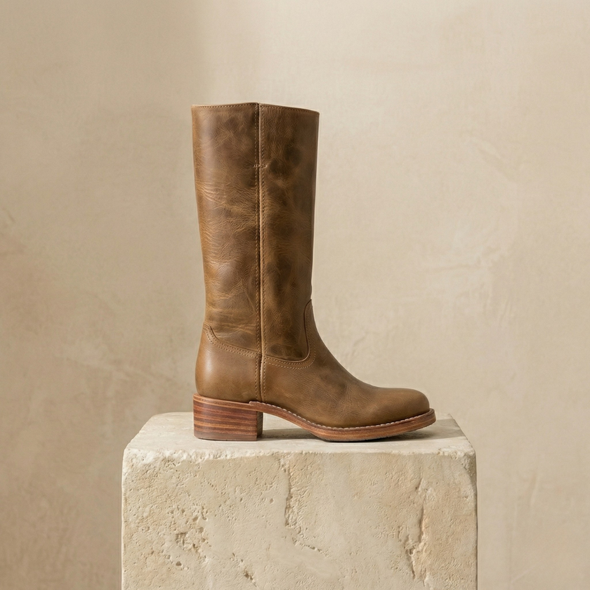 Tan knee-high block heel leather boots for women by FJØRNA, featuring winter-ready design and sturdy heel for stylish warmth.