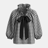 FJØRNA gingham ruffle oversized blouse for women with long sleeves, featuring a stylish, flowy design and ruffle details.