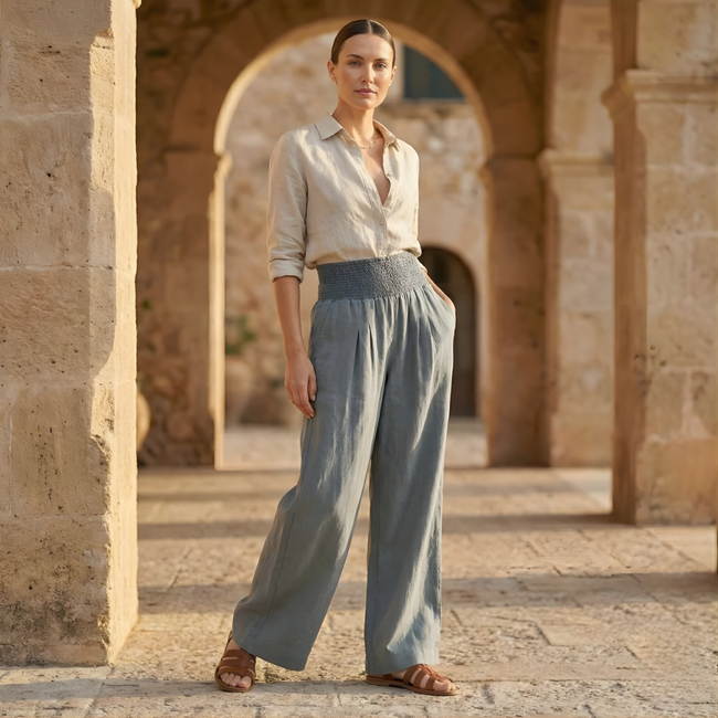 FJØRNA high waist white wide leg trousers for women, stylish and comfortable pants with a flowing wide-leg design.