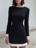 FJØRNA black contrast-trim long-sleeve mini cocktail dress, close-up view showing sleek design and stylish details.