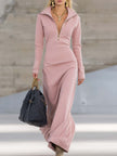 Pink V-neck maxi dress by FJØRNA featuring a flowing silhouette and elegant design for evening occasions.