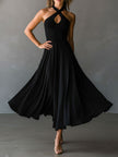 Black halter neck midi dress from FJØRNA featuring a fitted silhouette and elegant evening dress design.