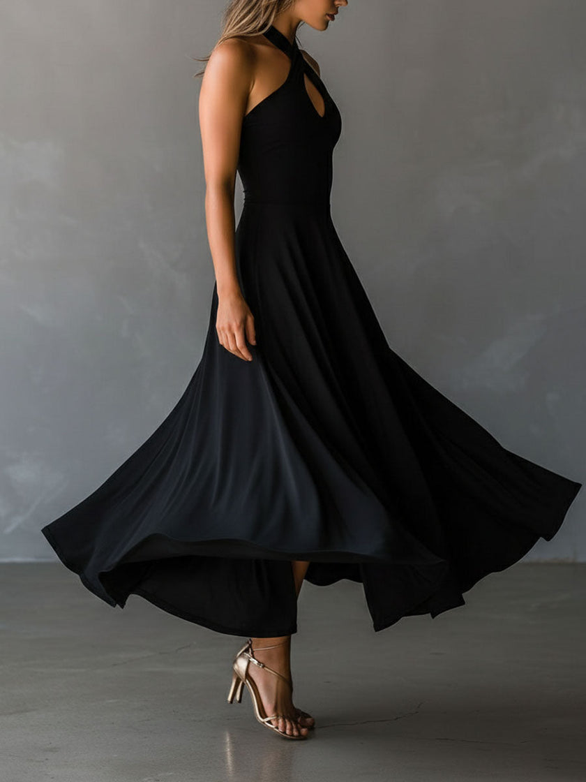 FJØRNA black halter neck midi dress, elegant evening dress with fitted bodice and flowing skirt, ideal for formal occasions.