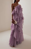 FJØRNA halter neck layered ruffle maxi dress for wedding guests, featuring a flowing design and elegant ruffle details.