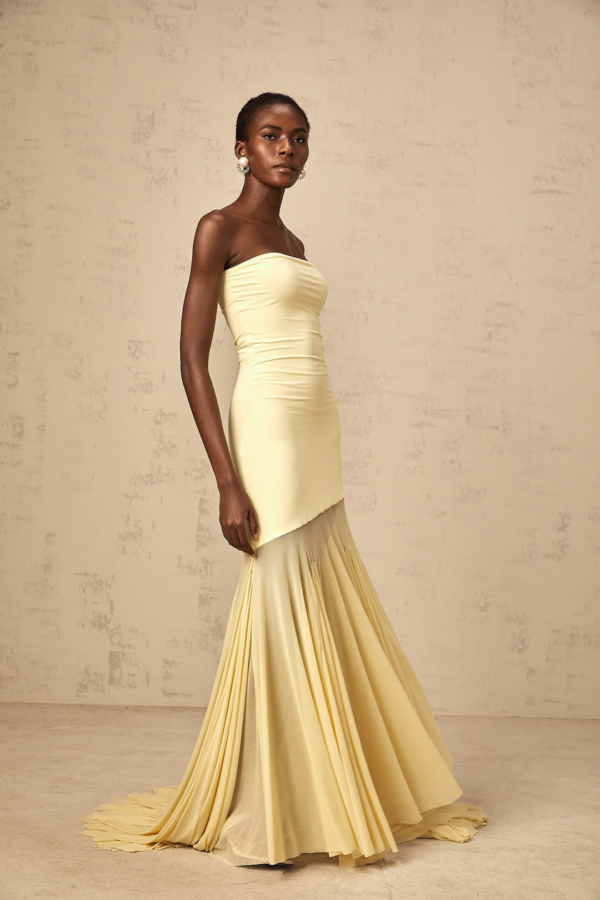 FJØRNA yellow off-shoulder sheer tulle maxi dress for women, elegant black tie dress with flowing fabric and off-shoulder design.
