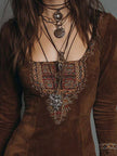 Brown suede embroidered boho mini dress by FJØRNA featuring a leather dress look and intricate embroidery details.