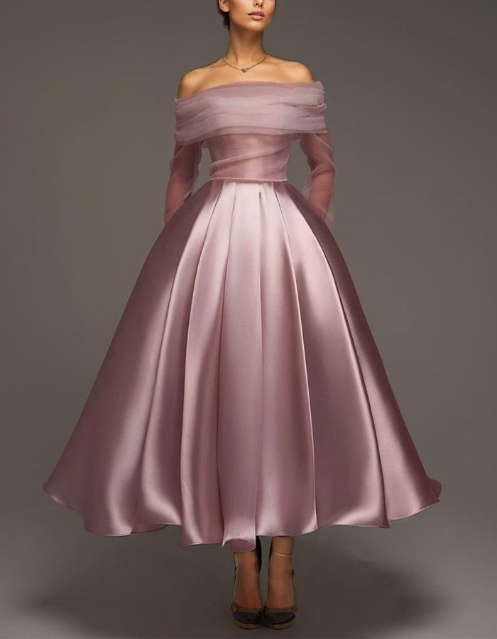 Pink satin midi dress for women by FJØRNA featuring strapless, A-line silhouette and strappy shawl detail.