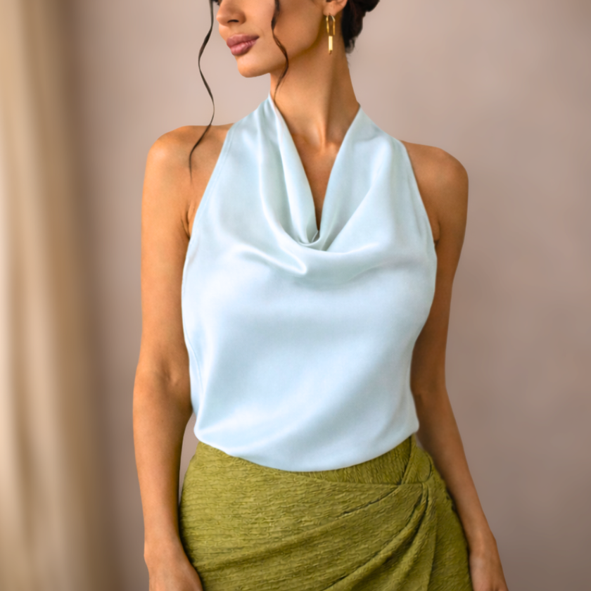 Cream satin cowl neck sleeveless top for women by FJØRNA, featuring a stylish mock neck and smooth fabric.