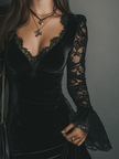 FJØRNA velvet mini evening dress displayed on a hanger with a fitted silhouette and elegant design.