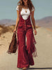 Brown micro suede tassel wide-leg women's dungarees by FJØRNA, featuring tassel details and a relaxed fit.