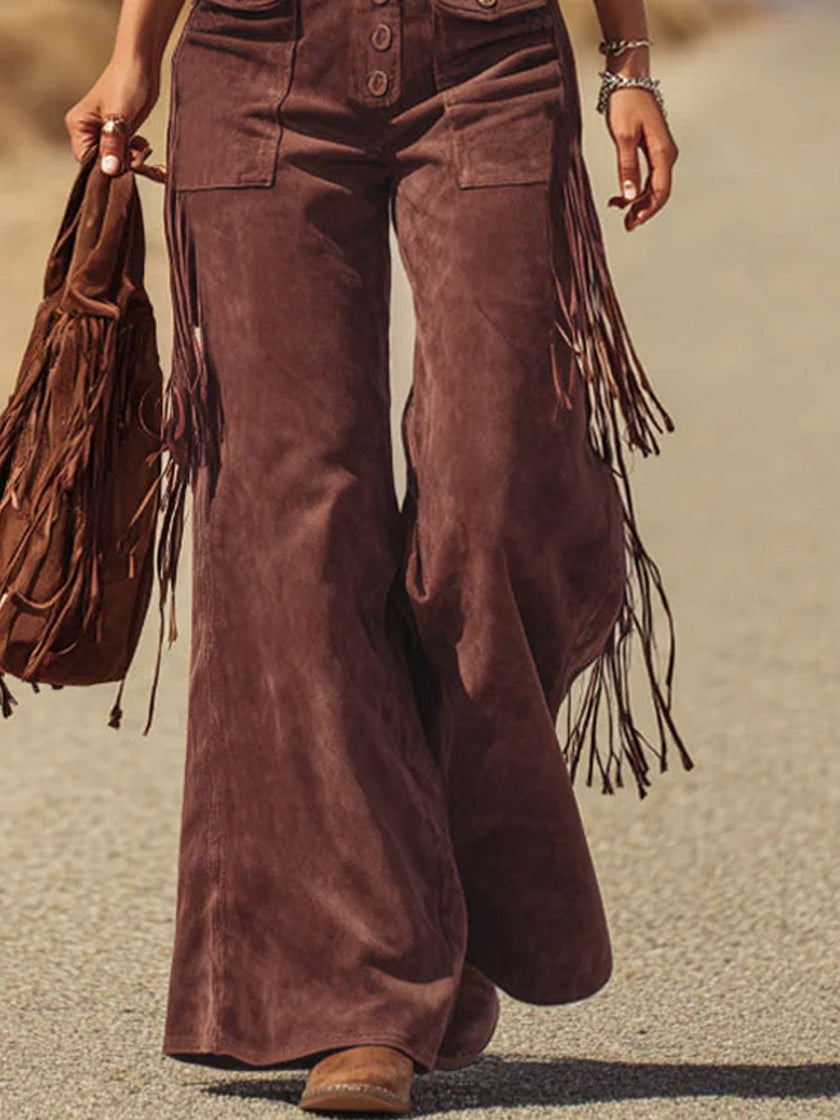 Women's brown micro suede tassel wide-leg dungarees by FJØRNA, featuring a relaxed fit and tassel details.