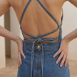 FJØRNA women's denim wide leg jumpsuit with tie-back design, casual and stylish denim set for relaxed wear.