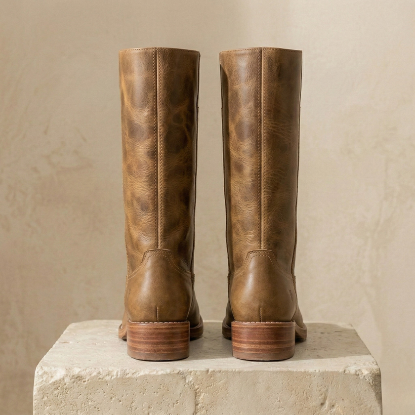 Tan knee-high block heel boots for women by FJØRNA, featuring winter leather design and stylish footwear for cold weather.