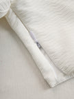 Cream textured lantern sleeve two-piece set for women featuring stylish pants by FJØRNA.