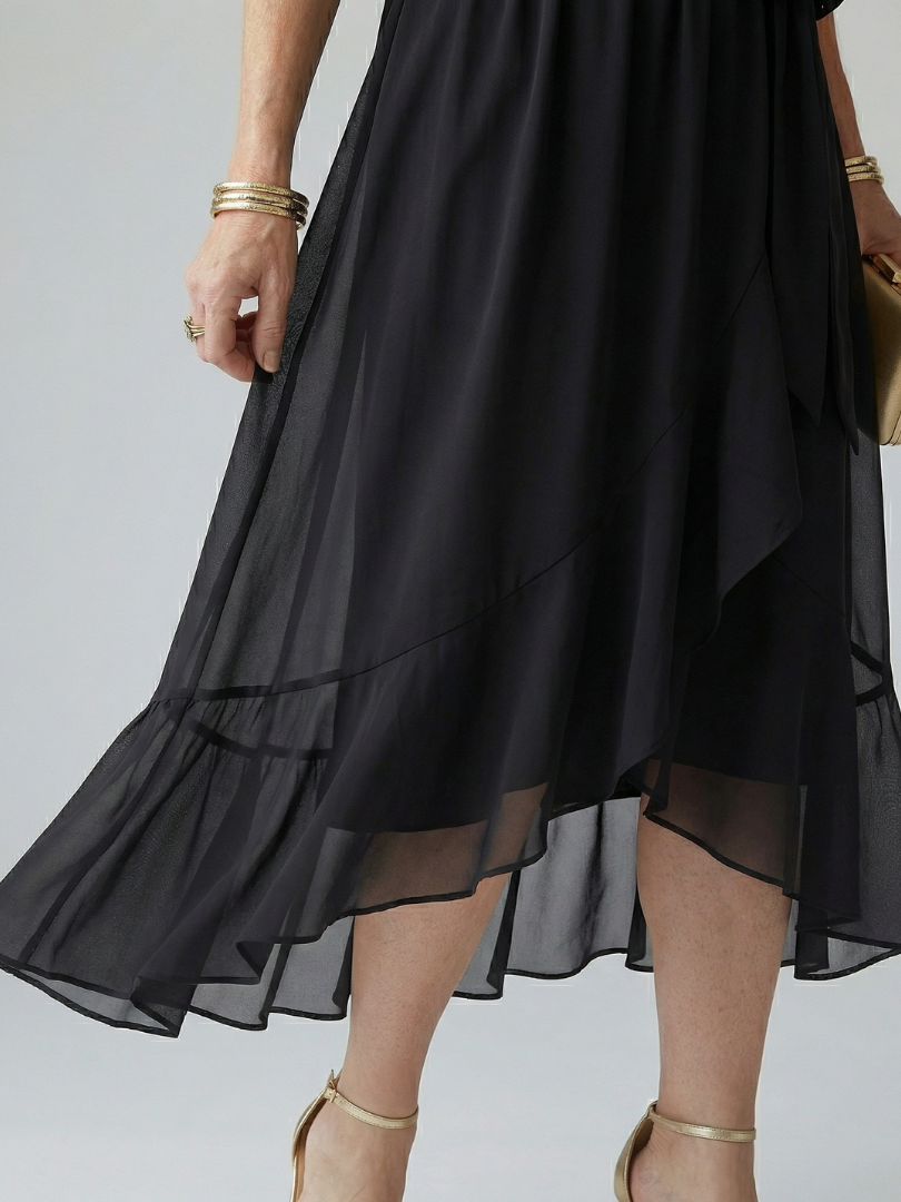 FJØRNA women's summer midi dress, flowy and lightweight, featuring a breezy design perfect for warm weather and casual occasions.