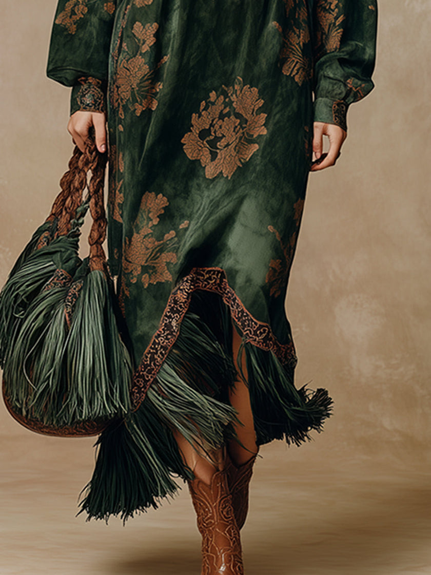 Green faux suede tassel maxi dress for women by FJØRNA, featuring a flowy silhouette and tassel details.