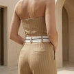 FJØRNA women's pinstripe strapless wide-leg jumpsuit, stylish wedding guest set with a tailored fit and elegant design.