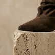 Brown slouchy frill ankle boots for women by FJØRNA featuring a Chelsea boot style with a relaxed, frilled design.