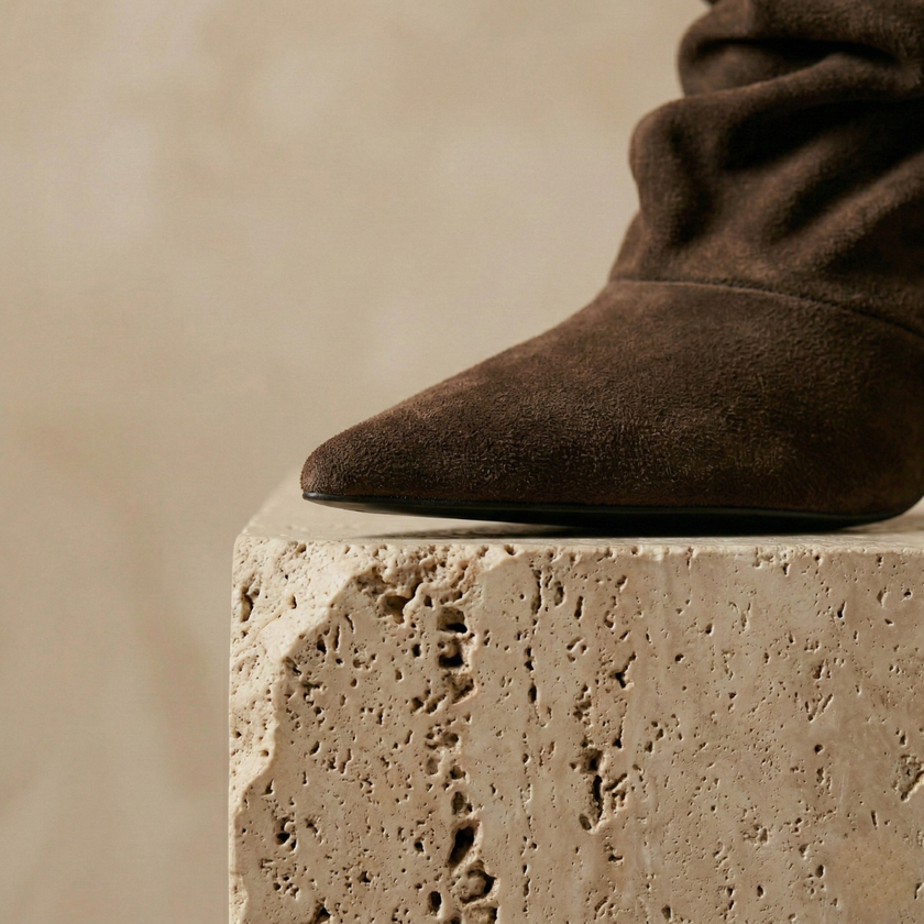 Brown slouchy frill ankle boots for women by FJØRNA featuring a Chelsea boot style with a relaxed, frilled design.