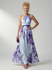 FJØRNA women's floral summer maxi dress with halter neck and sleeveless design, perfect for warm weather and outdoor occasions.
