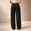 FJØRNA women's wide-leg drawstring lounge trousers, loose pull-on pants with relaxed fit and comfortable waistband.