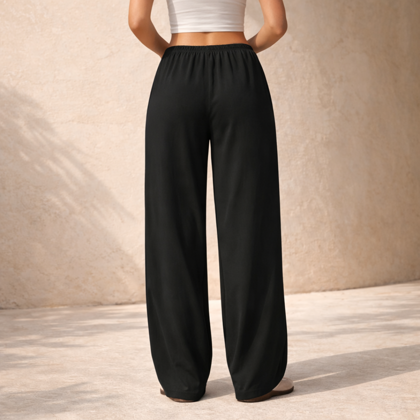 FJØRNA women's wide-leg drawstring lounge trousers, loose pull-on pants with relaxed fit and comfortable waistband.
