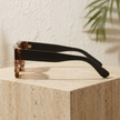 FJØRNA vintage 90s rectangular unisex sunglasses with retro design, accessory for women and men, featuring bold frames and dark lenses.