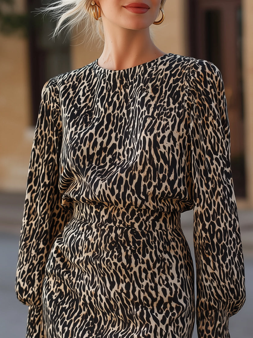 FJØRNA leopard print long-sleeve tailored mini dress, stylish occasion dress with fitted silhouette and animal print fabric.