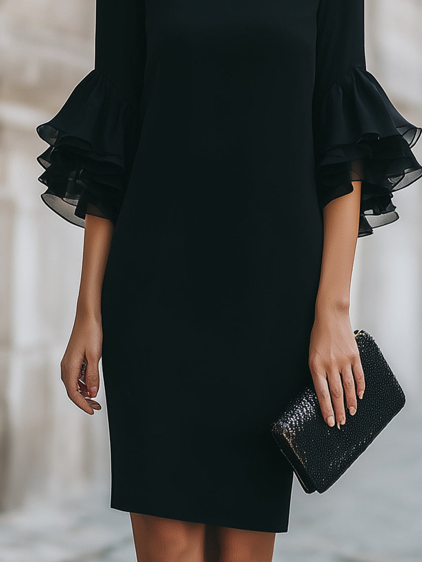 FJØRNA black ruffled sheer sleeve midi dress, a stylish cocktail dress with elegant ruffle details and a fitted silhouette.