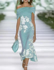 Green lace midi dress for women by FJØRNA featuring delicate lace fabric and a stylish midi length.