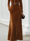 Black chestnut velvet maxi dress with shirt collar by FJØRNA, featuring a flowing silhouette and elegant design for women.
