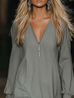 Grey FJØRNA V-neck mini dress, casual style, showing the fit and neckline on a model. Perfect for everyday wear.