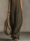 Olive green FJØRNA sleeveless knit maxi dress with a relaxed fit, featuring a v-neck and side slit for casual style.