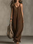 FJØRNA olive green sleeveless knit maxi dress with a relaxed fit, casual style, and flowing silhouette.