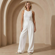 Women's high-waist wide-leg tailored trousers by FJØRNA, loose pull-on pants in soft fabric with a relaxed fit.