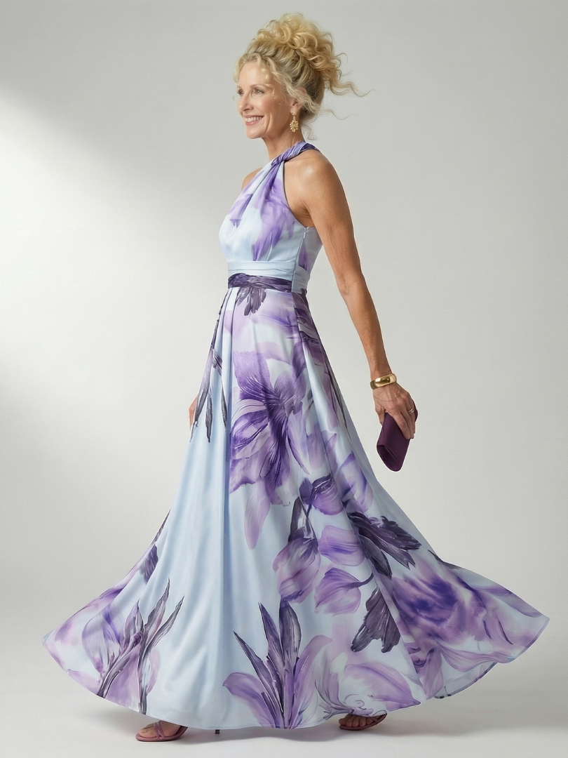 FJØRNA women's floral summer maxi dress with halter neck and sleeveless design, relaxed fit perfect for warm weather.